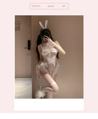 Overhead flat lay of white bunny girl lingerie set showing full costume layout thumbnail